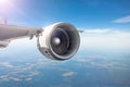 View of the engine on the wing of the aircraft during the flight in the sky Royalty Free Stock Photo