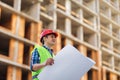 Portrait of an Engineer checking plan on construction site Royalty Free Stock Photo