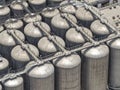 View of enormous vertical silos for industrial-scale beer fermentation Royalty Free Stock Photo