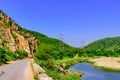 View enroute to Kumbhalgarh fort road through Rhyolite an extrusive volcanic igneous rock mountains in Aravalli Mountains,