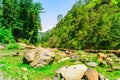 View enroute to Prashar Lake trekk trail through river bed. It is located at a height of 2730 m above sea level surrounded by