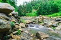 View enroute to Prashar Lake trekk trail through small waterfall rivulet. It is located at a height of 2730 m above sea level