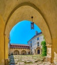The view through the entrance arch on the courtyard of Olesko Castle, Ukraine Royalty Free Stock Photo