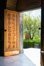 Entrance door of Saint Mesrop Mashtots church with Armenian alphabet engraving, Oshakan, Armenia