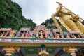 View of entrance to Batu Caves with the world`s tallest Murugan statue, where is a limestone hill that has a series of caves and