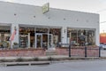 View of the entrance and the windows of an antique shop captured in McKinney, Texas, United States