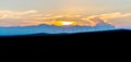 View of Eolian generators in a beautiful sunset light. Eolian turbine farm. Wind turbine silhouette. Wind field turbines. Wind pro