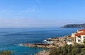 View of the Epiphany ceremony at Kardamyli Greece after the priest has thrown the cross in the ocean and young men from the town h