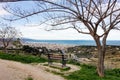 The view from lookout above the Patras city in Greece with a tree and a bench to relax and admire the beautiful cityscape Royalty Free Stock Photo