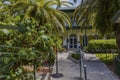 View on The Ernest Hemingway Home and Museum. Beautiful green trees at the entrance checkpoint. USA. Key West. Royalty Free Stock Photo