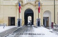 A view of ErzbischÃÂ¶fliches Palais gate and sentinels in the prag castle