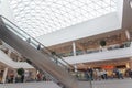 View on escalator in modern shopping mall Triniti