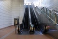 View of escalators in train station, leading to exit. For mock up template purpose OOH out of home advertising display Royalty Free Stock Photo