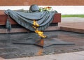 View of the Eternal Flame on the grave of the Unknown Soldier in Moscow in cloudy rainy weather