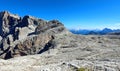 view of the European Alpine mountains with a moonscape-like scenery mountain refuge nestled among the rocks