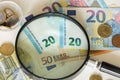 View of the European money / Euro under the magnifying glass Royalty Free Stock Photo