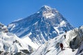 View of Everest from Gokyo valley with group of climbers