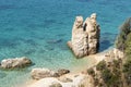 View of exotic beach, cliff, turquoise blue sea Greece, Halkidiki, Athos peninsula, Trimi beach Geological wonder nature