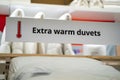 View of Extra Warm duvets sign in store Royalty Free Stock Photo