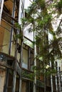 View of the facade of an abandoned old crumbling building