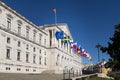 View of the facade of the Assembleia da Republica Portuguese Parliament, with the European union countries flags raised in order Royalty Free Stock Photo