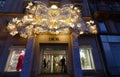 View of facade of Christian Dior Paris with christmas decoration. It located at prestigious Saint Honore street in