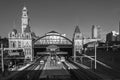 View of the facade and the movement of trains and passengers at the boarding amd arrival platforms in Luz station