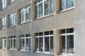 View of the facade of an office building with large Windows. New wide double glazed windows installed in a modern building