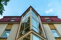 View of the facade of an office building with large Windows. New wide double glazed windows installed in a modern building