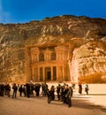 View of the facade of the Treasury building in the ancient Nabatean ruins of Petra, Jordan.
