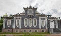 View of facade of wooden house of Decembrist Sergei Trubetskoy in Irkutsk in summer in cloudy weather