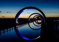 View of the Falkirk Wheel at night with lights in Ukraine colors for solidarity Royalty Free Stock Photo