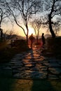 A view of family passing by a bridge on the West Lake in Hangzhou