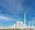 View of famous Abu Dhabi Sheikh Zayed Mosque by night, UAE.