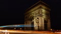 View of the famous Arc de Triomphe in Charles de Gaulle square at night in Paris Royalty Free Stock Photo