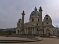 View of famous church Karlskirche located at square Karlsplatz in the historic center of Vienna, Austria on cloudy day.