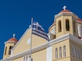 View of the famous Church of Saint Ekaterini Agia Ekaterini in Sitia with flag in Greece Royalty Free Stock Photo