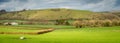 Panorama of rural Dorset nearby the Cerne Abbas village, view of the famous hill figure known as The Cerne Abbas Giant Royalty Free Stock Photo