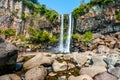 View of famous Jeongbang Waterfall on Jeju Island of South Korea Royalty Free Stock Photo