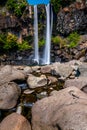 View of famous Jeongbang Waterfall on Jeju Island of South Korea Royalty Free Stock Photo