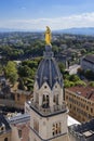 View of famous Marie statue on top of Notre-dame-de-fourviere basilica in Lyon Royalty Free Stock Photo