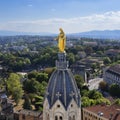 View of famous Marie statue on top of Notre-dame-de-fourviere basilica in Lyon Royalty Free Stock Photo