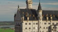 View of famous Neuschwanstein Schloss, Fussen, Bavaria, Germany, seen from Marienbrucke Marys Bridge, pedestrian bridge