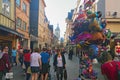 View of famous pedestrian Gros Horloge street Fr: Rue de Gros Horloge. The street always filled with tourists