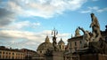 View of the famous Roman square Piazza del Popolo from behind the complex of statues of the Triton Royalty Free Stock Photo