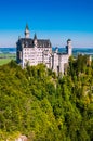 View of the famous tourist attraction in the Bavarian Alps - the 19th century Neuschwanstein castle Royalty Free Stock Photo