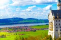 View of the famous tourist attraction in the Bavarian Alps - the 19th century Neuschwanstein castle. Royalty Free Stock Photo