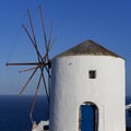 View of famous windmill in Oia