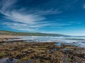 Beautiful Fanore beach county Clare, Ireland, Blue cloudy sky, and ocean water, Stretch of yellow sand