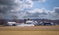 View of a Farm Homestead With Barns, Silos, Farm House and Other Buildings